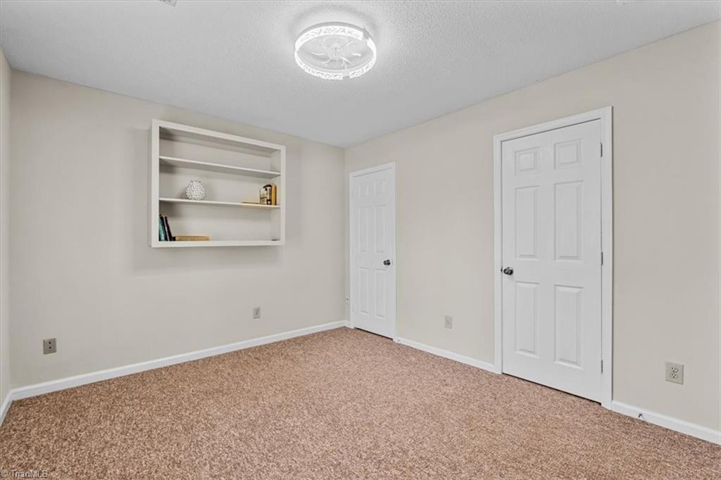 814 Guilford College Road, Unit 133 Greensboro, NC 27409 - Photo 12 of 18 Bedroom 2 with 2 closets