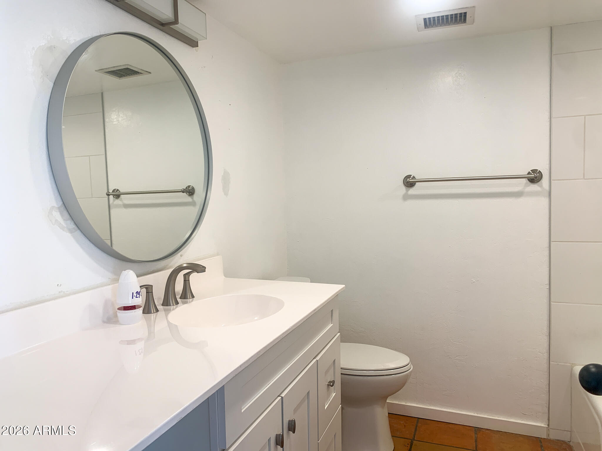 805 North 4th Avenue, Unit 902 Phoenix, AZ 85003 - Photo 11 of 35 a bathroom with a sink and a mirror