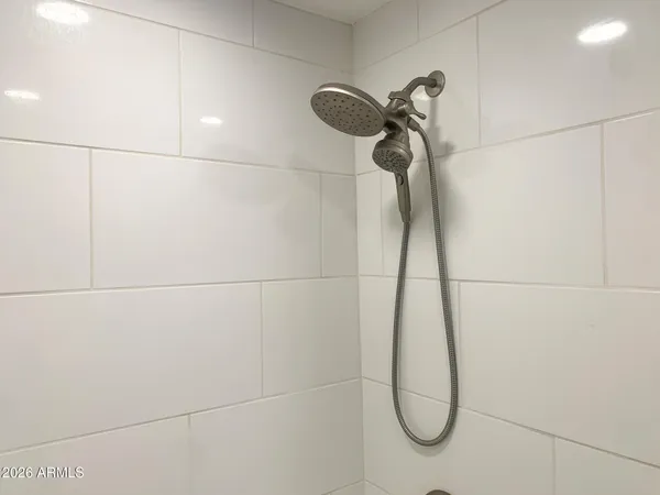 a view of balcony with a door and a window