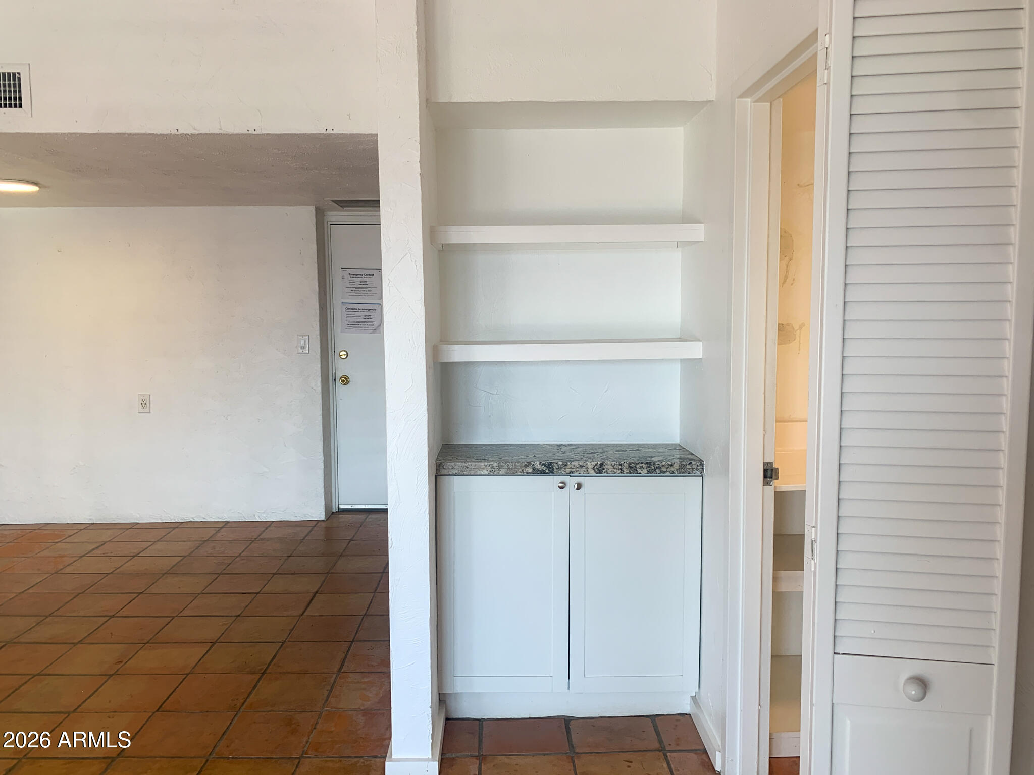805 North 4th Avenue, Unit 902 Phoenix, AZ 85003 - Photo 15 of 35 a view of walk in closet with empty racks