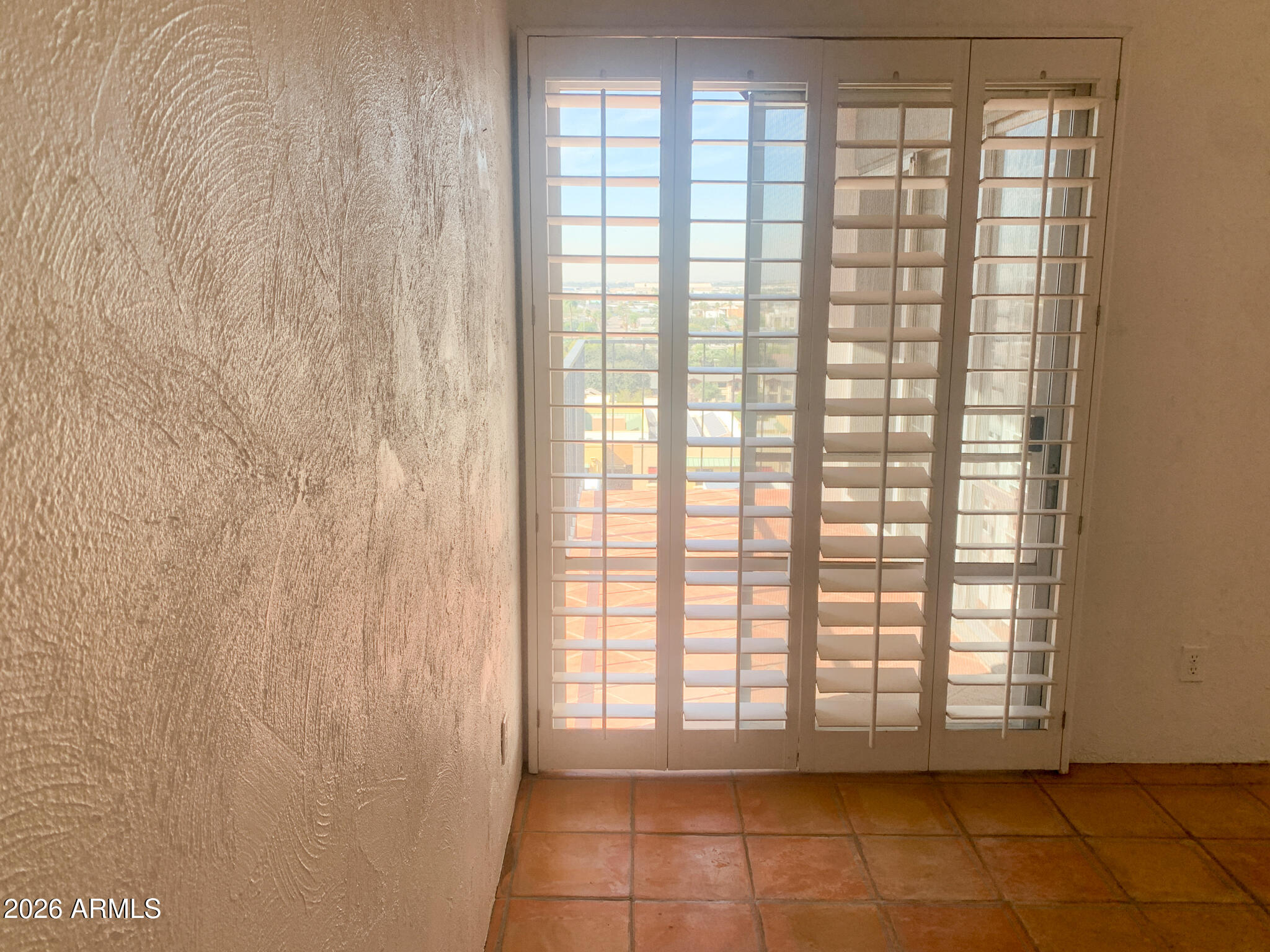 805 North 4th Avenue, Unit 902 Phoenix, AZ 85003 - Photo 17 of 35 a view of an empty room with a window
