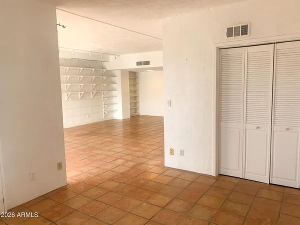 a front view of a building with street view