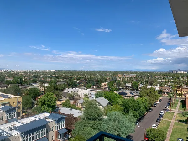 a view of a car park in front of house