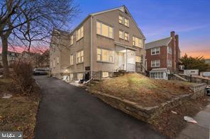 46 South State Road Upper Darby, PA 19082 - Photo 1 of 32 a large building with trees in front of it