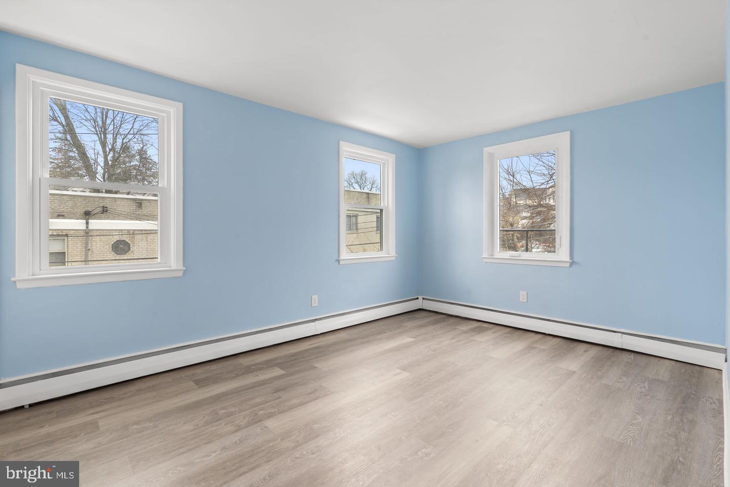 46 South State Road Upper Darby, PA 19082 - Photo 19 of 32 a view of an empty room with windows