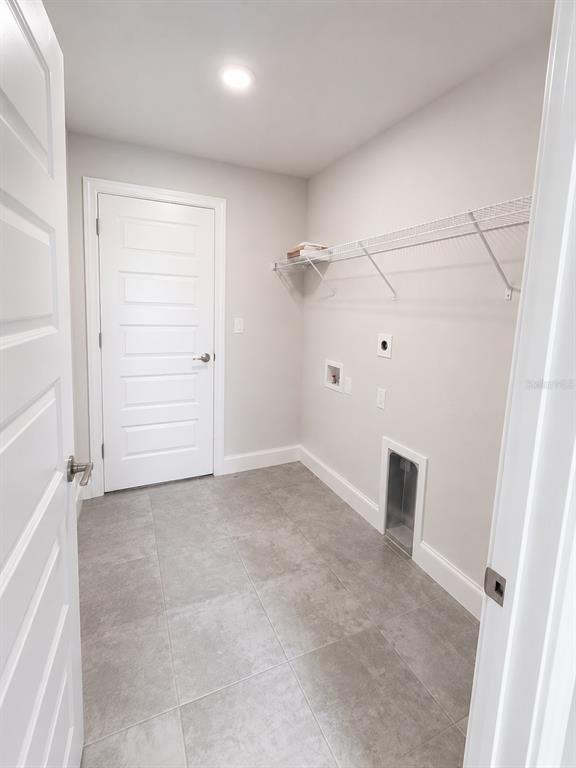5892 Southwest 82nd Lane Ocala, FL 34476 - Photo 16 of 24 an empty room with closet and windows
