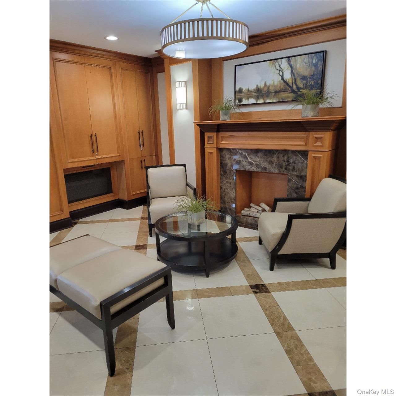 118-18 Union Turnpike, Unit 5J Queens, NY 11415 - Photo 5 of 24 a living room with furniture and a fireplace