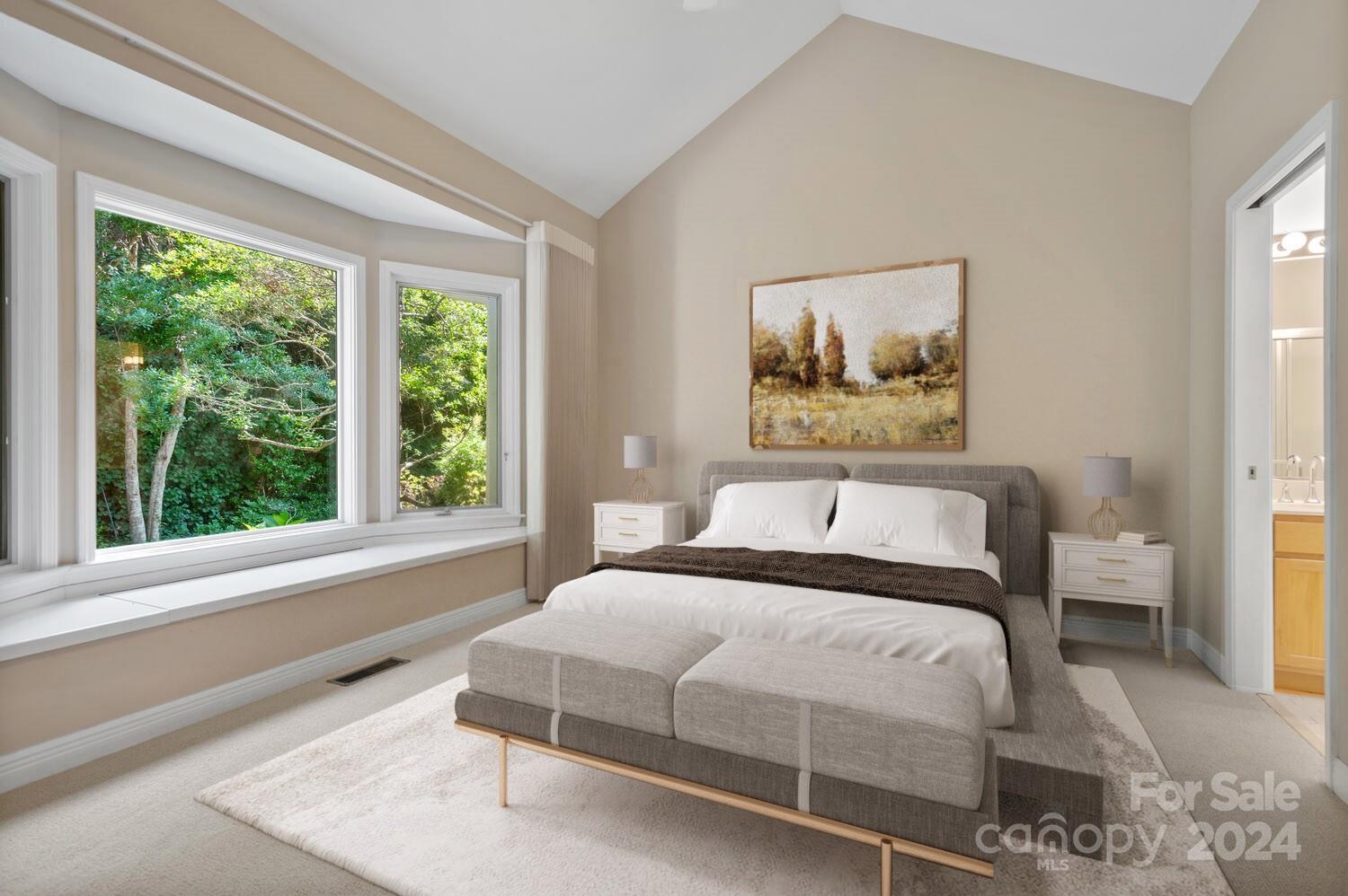 56 Pinnacle Point Drive Asheville, NC 28805 - Photo 21 of 38 a bedroom with a bed and a painting on the wall