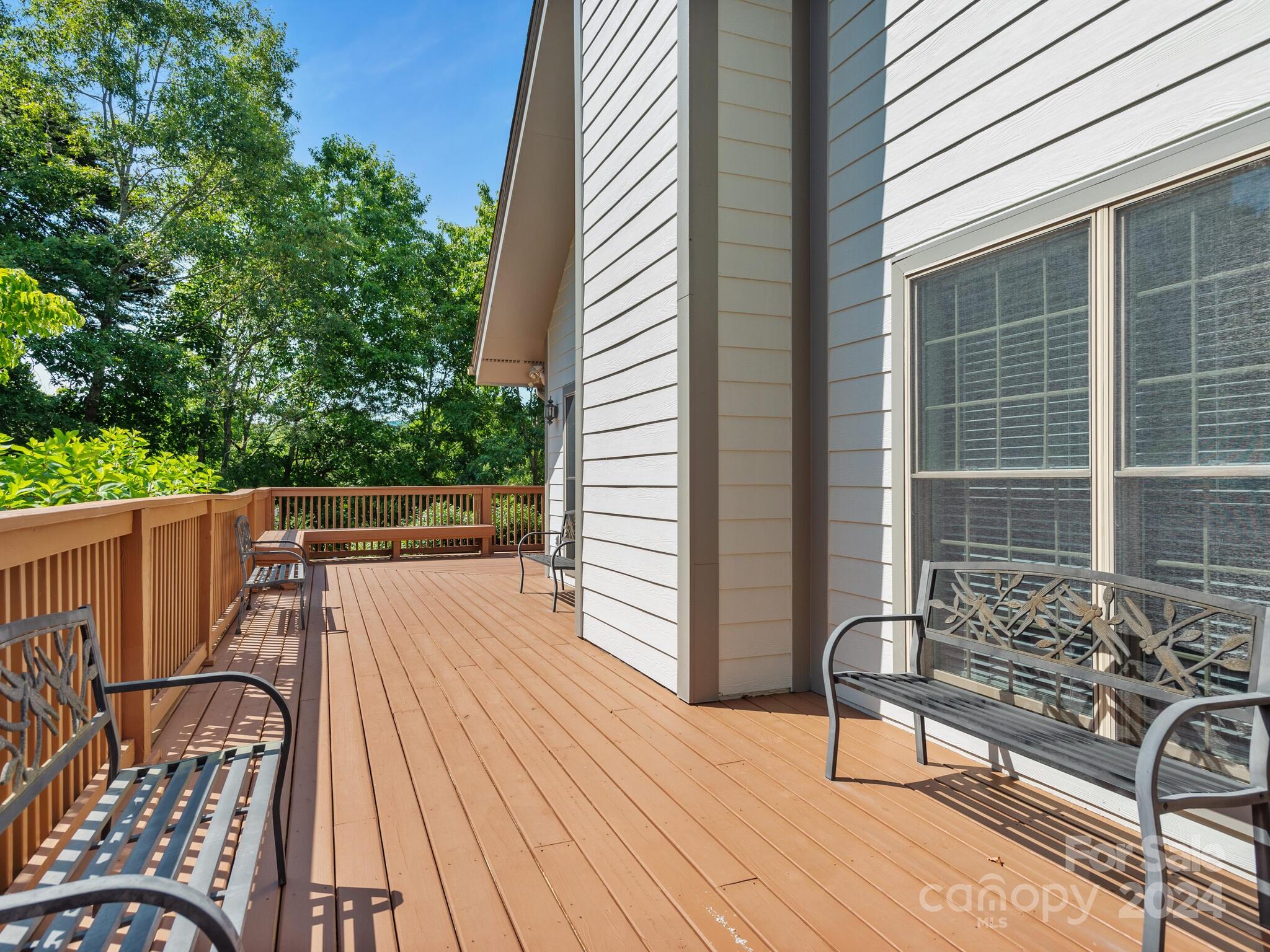56 Pinnacle Point Drive Asheville, NC 28805 - Photo 38 of 38 a view of balcony with wooden floor and seating space