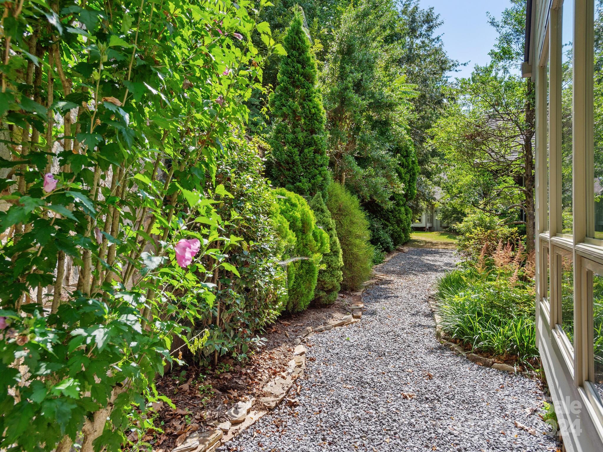 56 Pinnacle Point Drive Asheville, NC 28805 - Photo 6 of 38 a backyard of a house with lots of green space