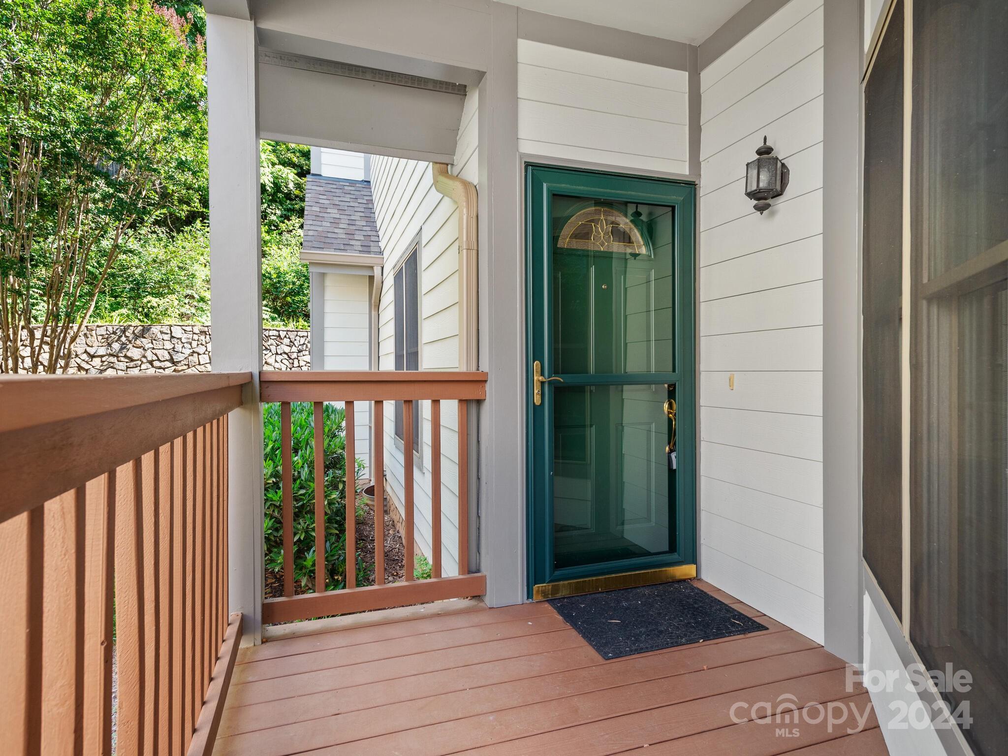 56 Pinnacle Point Drive Asheville, NC 28805 - Photo 9 of 38 a view of a door and wooden floor