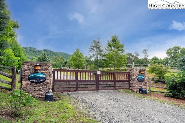 a childrens park with lots of swings and slides