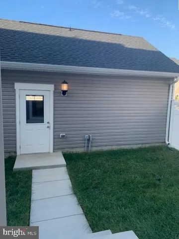 a view of a back yard of the house