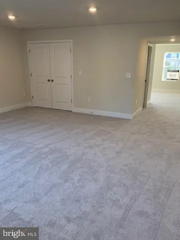 a brick building with a yard