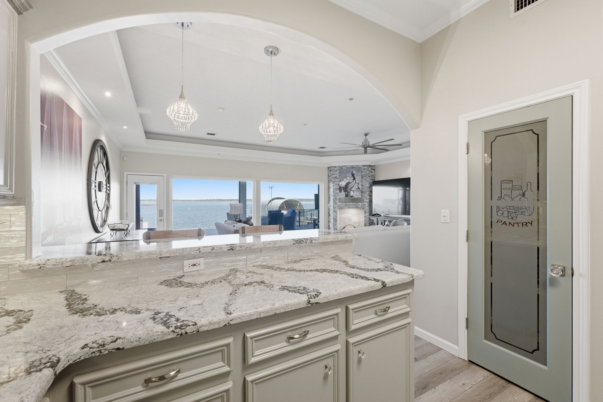 2 Regency Point Conroe, TX 77356 - Photo 13 of 44 Open to the living area and perfect for entertaining and enjoying the open water view.