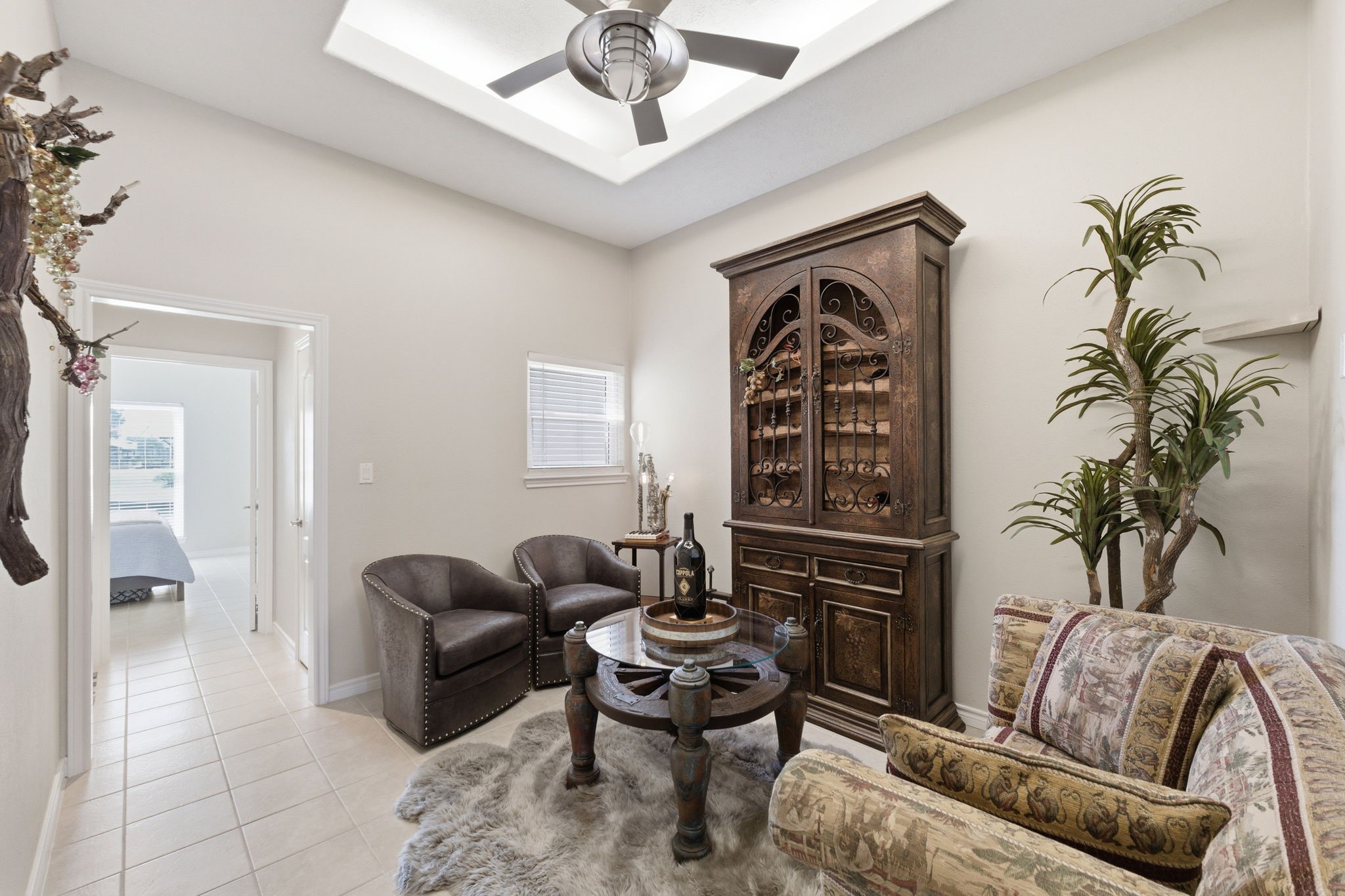 2 Regency Point Conroe, TX 77356 - Photo 21 of 44 Game room currently styled as a cozy sitting area, offering flexible space for relaxing, entertaining, or play.