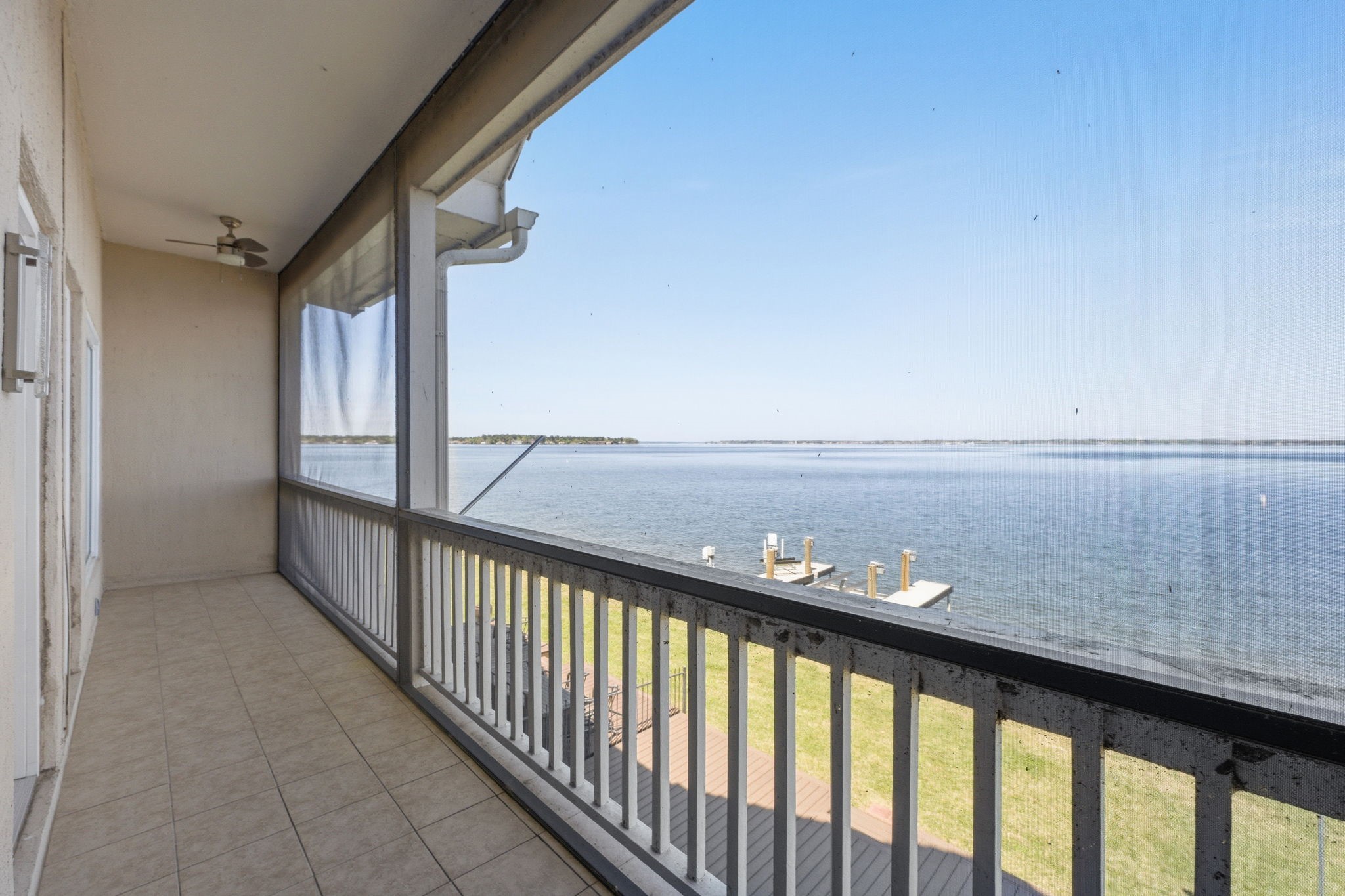 2 Regency Point Conroe, TX 77356 - Photo 29 of 44 Screened second floor balcony for year round comfort.