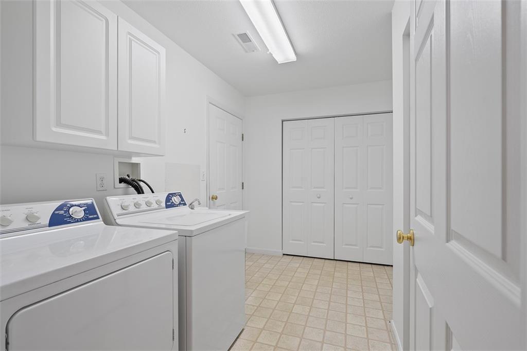 903 Hidden Meadows Circle Renfrew, PA 16053 - Photo 18 of 44 a utility room with dryer and washer