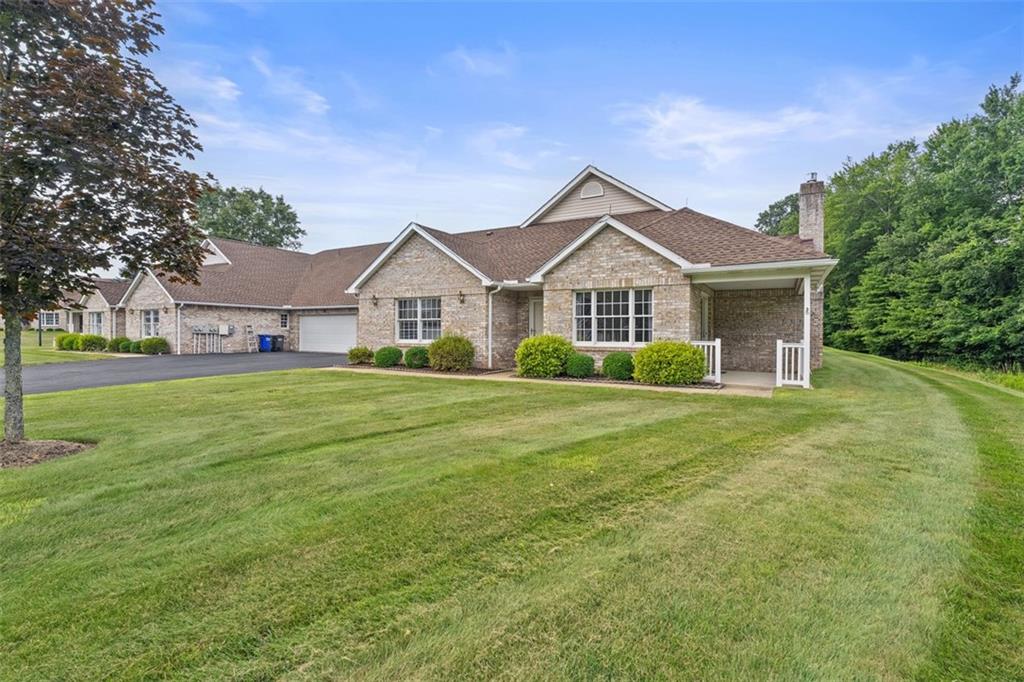 903 Hidden Meadows Circle Renfrew, PA 16053 - Photo 2 of 44 a front view of a house with a yard