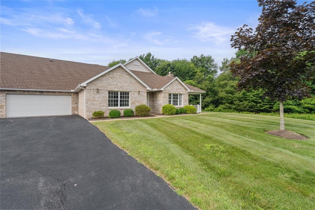 903 Hidden Meadows Circle Renfrew, PA 16053 - Photo 3 of 44 a front view of a house with yard