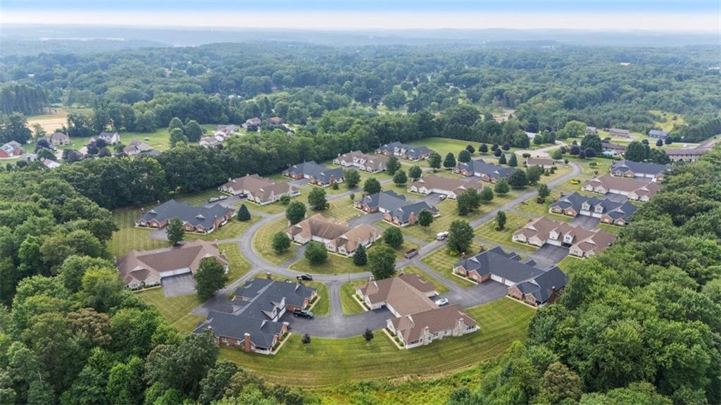 903 Hidden Meadows Circle Renfrew, PA 16053 - Photo 43 of 44 an aerial view of a house with a lake view
