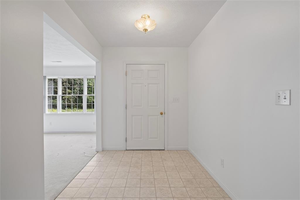 903 Hidden Meadows Circle Renfrew, PA 16053 - Photo 5 of 44 an empty room with a window