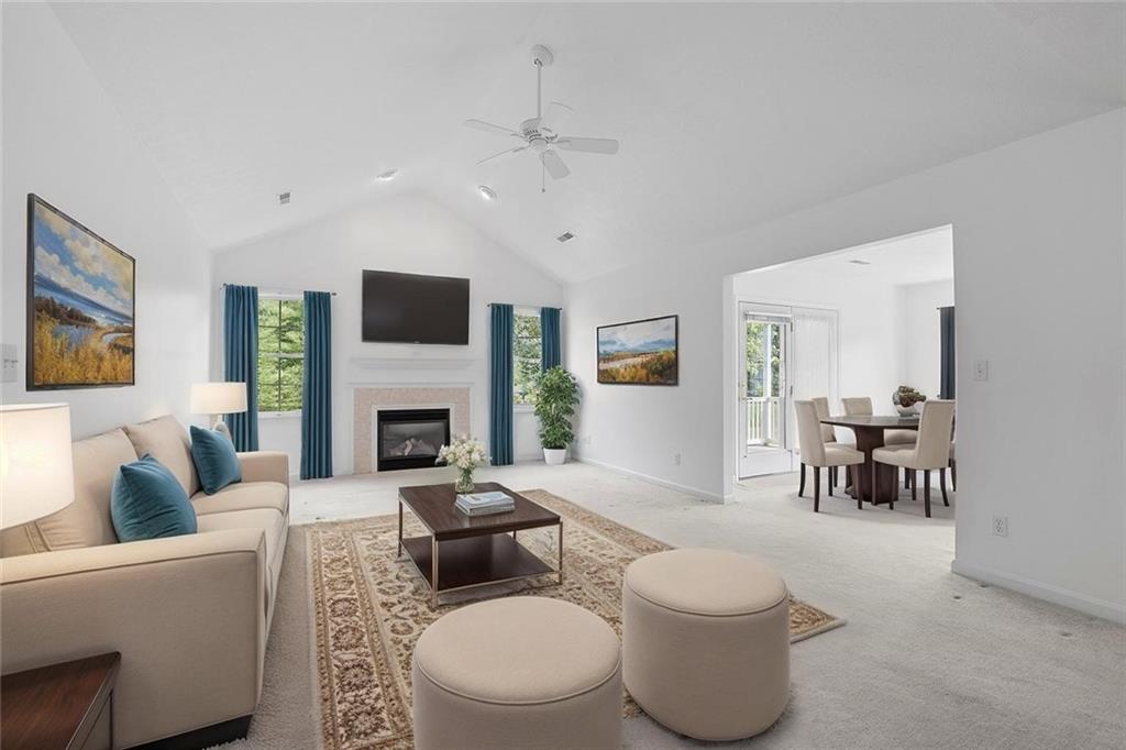 903 Hidden Meadows Circle Renfrew, PA 16053 - Photo 9 of 44 a living room with furniture a fireplace and a flat screen tv