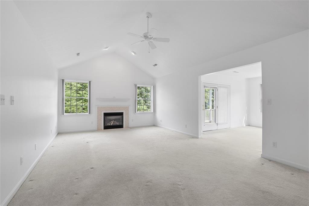 903 Hidden Meadows Circle Renfrew, PA 16053 - Photo 10 of 44 an empty room with windows and fireplace
