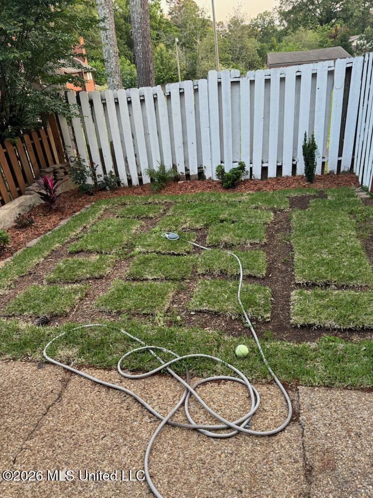1255 East County Line Road, Unit L7 Jackson, MS 39211 - Photo 3 of 16 Patio Area L7