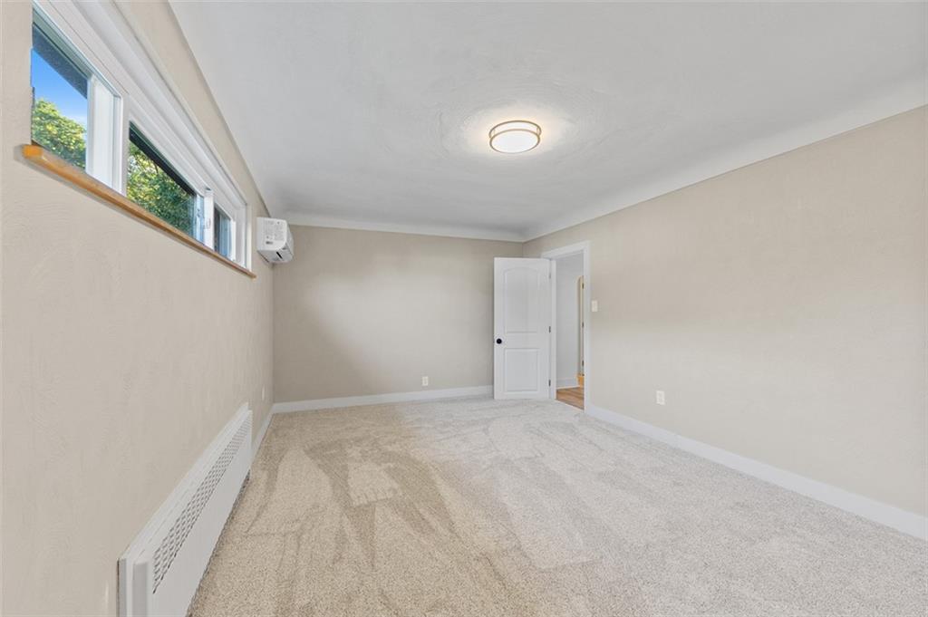 1812 Ridge Road Jeannette, PA 15644 - Photo 25 of 39 a view of an empty room with a window