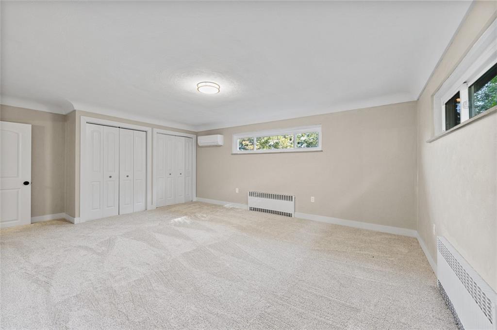 1812 Ridge Road Jeannette, PA 15644 - Photo 28 of 39 an empty room with windows