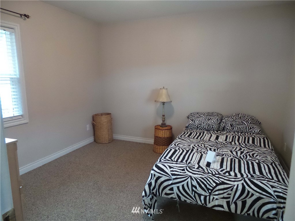 4227 Northeast North Shore Road Belfair, WA 98528 - Photo 10 of 14 a view of bedroom with a bed