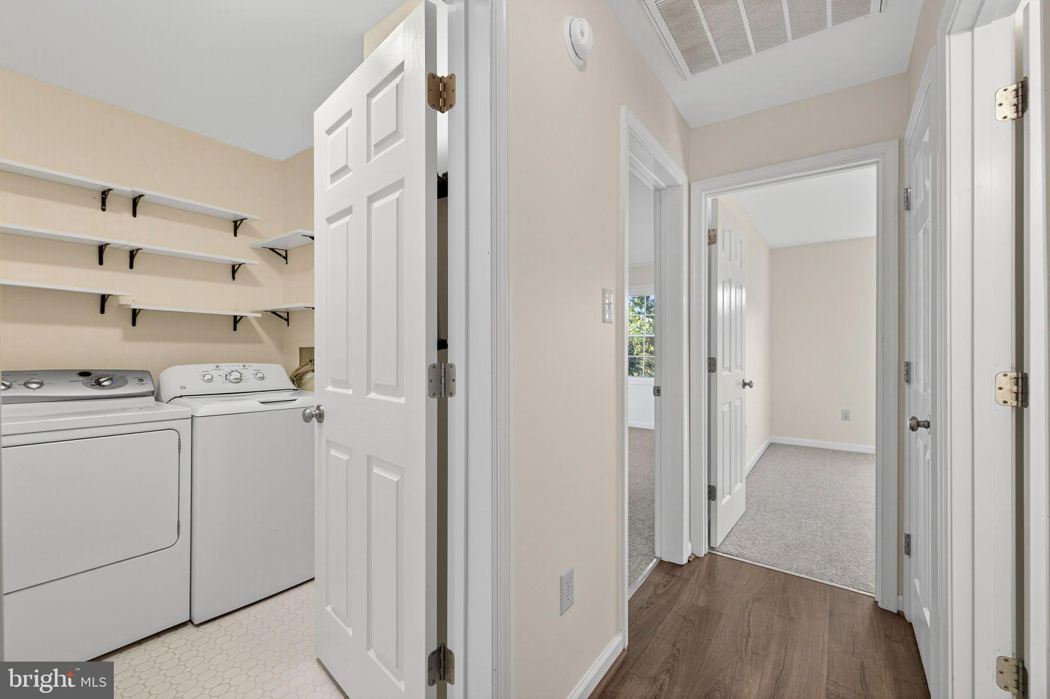 33018 Sunken Lane Upperville, VA 20184 - Photo 11 of 31 a view of utility room with washer and dryer