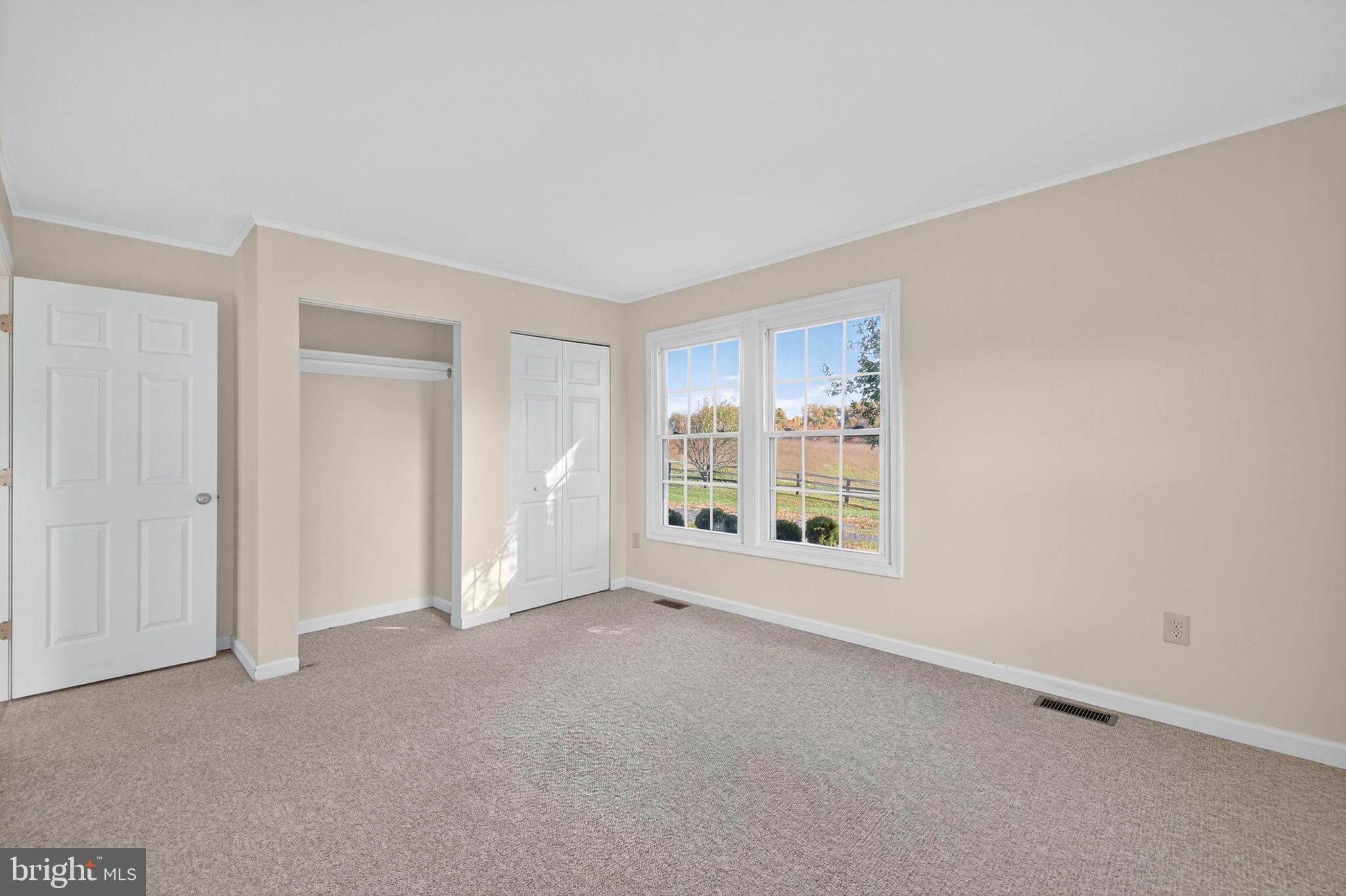 33018 Sunken Lane Upperville, VA 20184 - Photo 13 of 31 a view of an empty room with a window