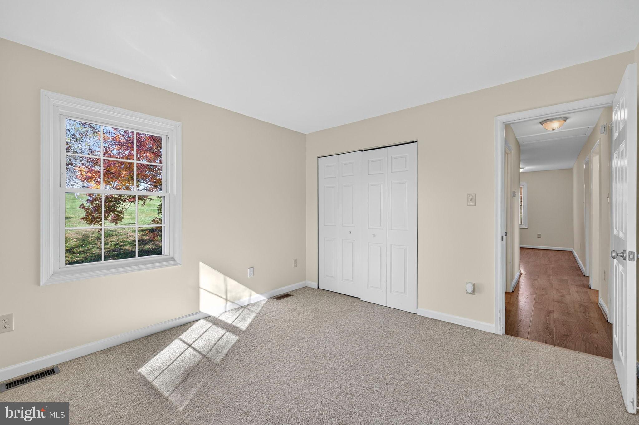 33018 Sunken Lane Upperville, VA 20184 - Photo 16 of 31 an empty room with windows