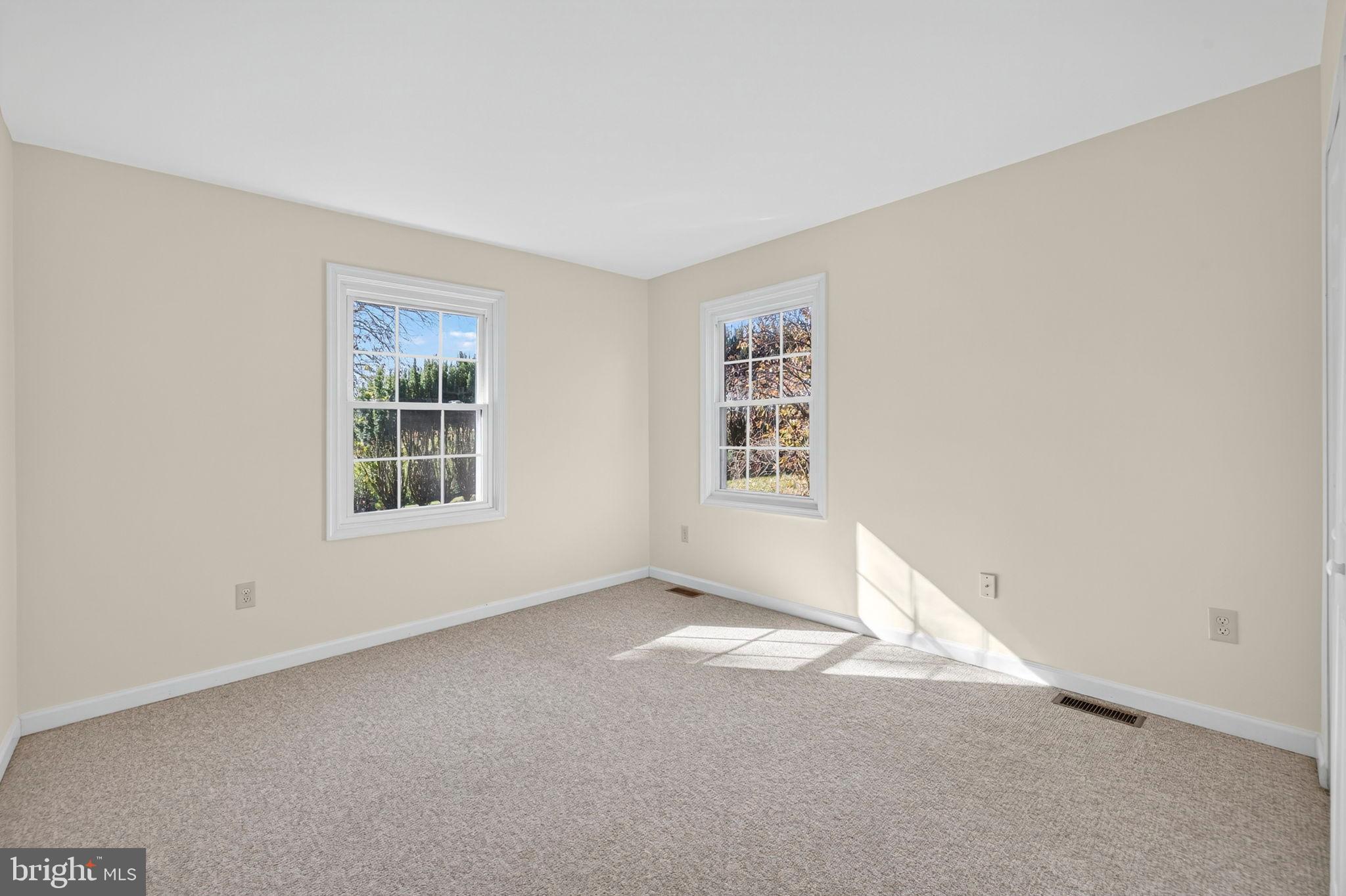 33018 Sunken Lane Upperville, VA 20184 - Photo 17 of 31 an empty room with windows