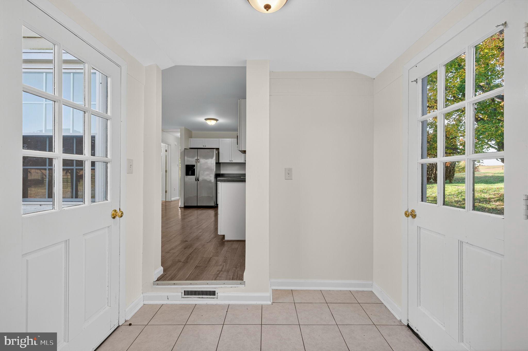 33018 Sunken Lane Upperville, VA 20184 - Photo 18 of 31 a view of a hallway with a bathroom