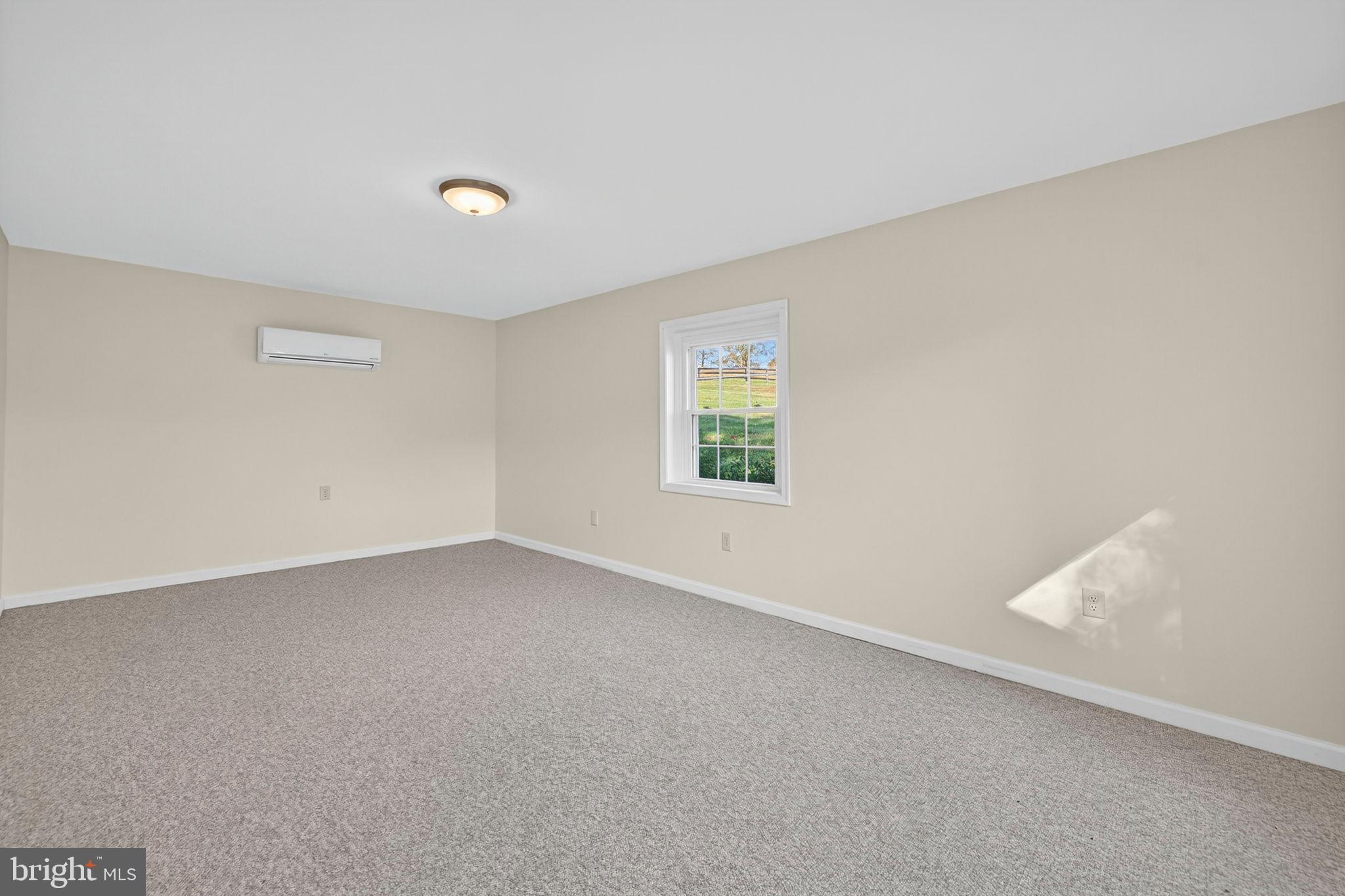 33018 Sunken Lane Upperville, VA 20184 - Photo 23 of 31 an empty room with a window