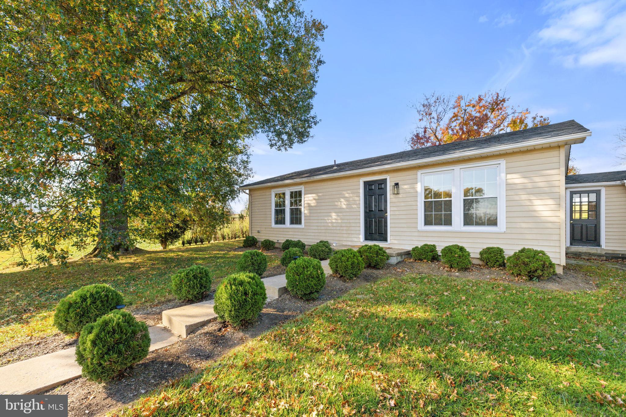 33018 Sunken Lane Upperville, VA 20184 - Photo 3 of 31 a view of a house with backyard and garden