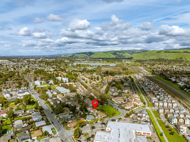 a view of city and green space