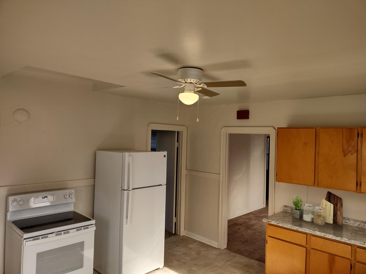 3323 Union Street Fremont, CA 94538 - Photo 29 of 41 a kitchen with a refrigerator and a stove top oven