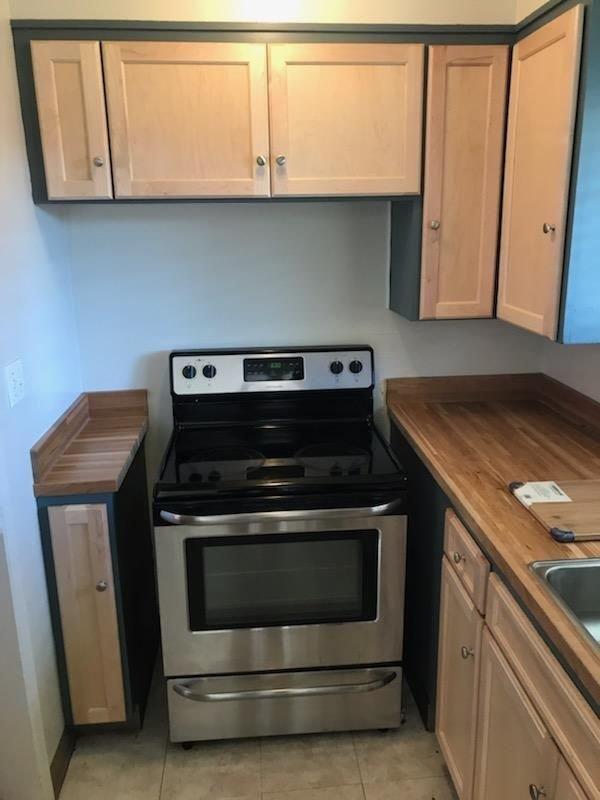 3323 Union Street Fremont, CA 94538 - Photo 30 of 41 a stove top oven sitting inside of a kitchen