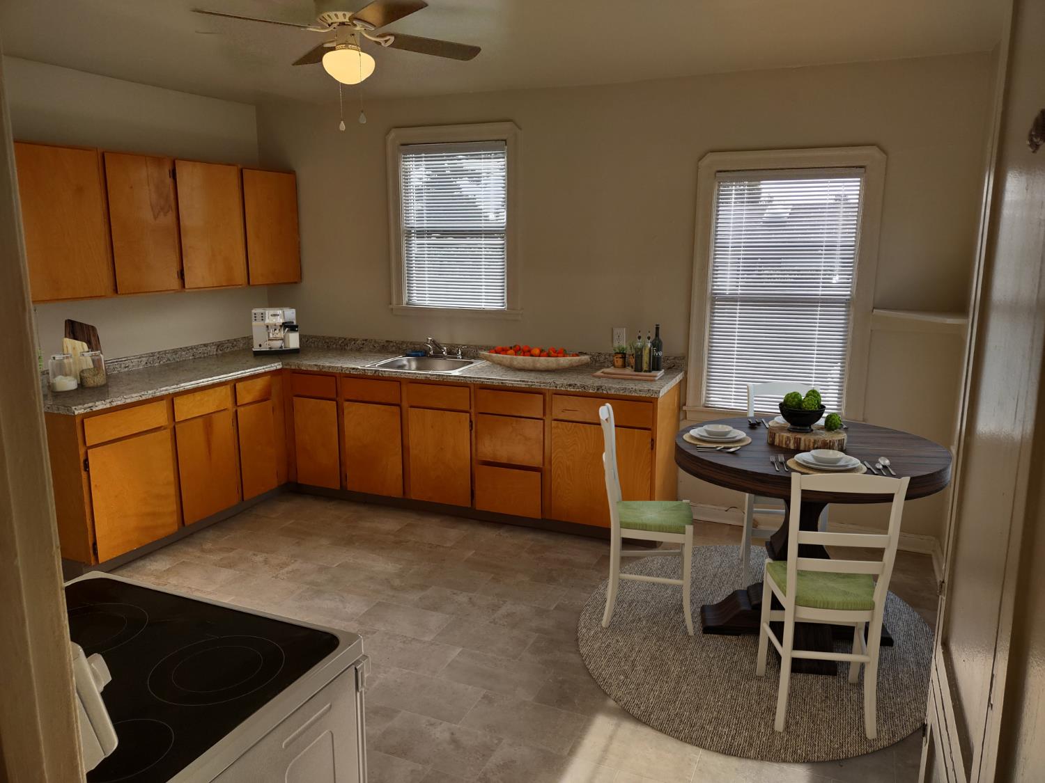 3323 Union Street Fremont, CA 94538 - Photo 6 of 41 a kitchen with stainless steel appliances granite countertop sink stove and cabinets