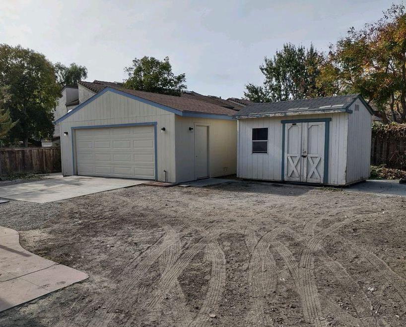 3323 Union Street Fremont, CA 94538 - Photo 9 of 41 a view of house with yard and garage