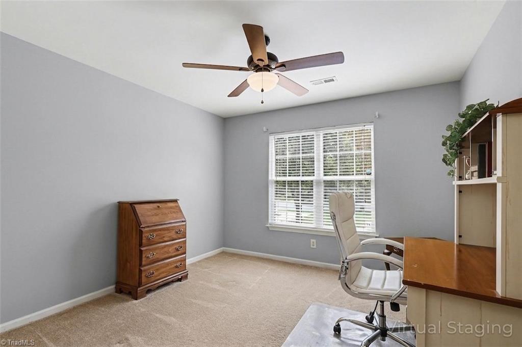 6310 Birch Pond Road Greensboro, NC 27410 - Photo 19 of 23 Third Bedroom with grey paint