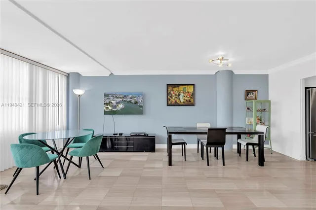 a view of a livingroom with furniture and window