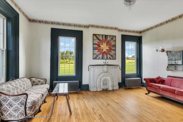 a bed room with a bed and chair