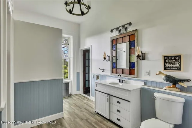 a view of a garage with wooden floors