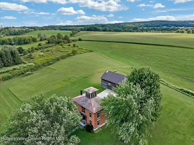 a view of a city with an ocean