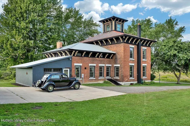 a view of a field with an ocean
